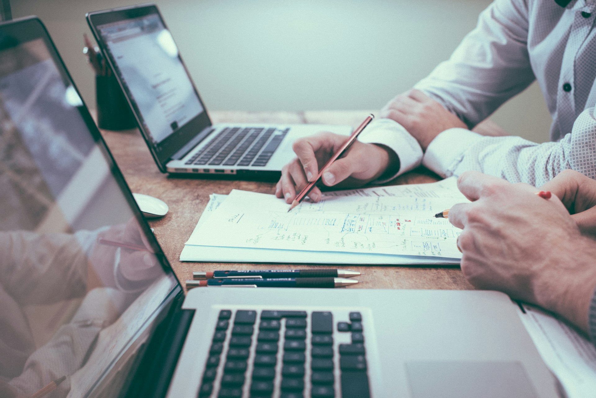Analysts reviewing trade documentation
